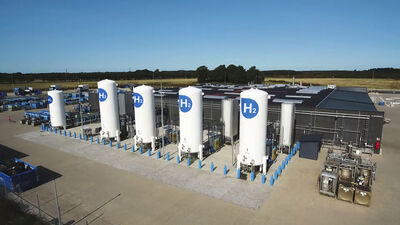 View of a green hydrogen plant, with five hydrogen storage tanks.