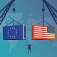 Business men command the tower crane to lift American containers and EU containers