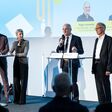 Gaby schaunig, Willibald ehrenhöfer, Régis Hamelin und Michael Jerne auf der Bühne bei der Ebscon Halbleitermesse 2025 in Graz.