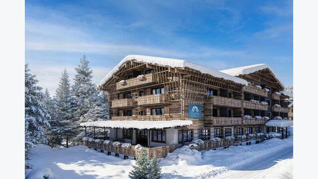 Außenansicht auf das Hotel Carpe Solem in Kaprun im Schnee