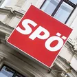 SPÖ Logo auf schild an hauswand