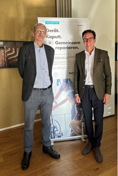 Matthias Neitsch, Geschäftsführer von Re-Use Austria und Werner Panhauser, Vorstand für Vertrieb und Marketing bei Helvetia Österreich