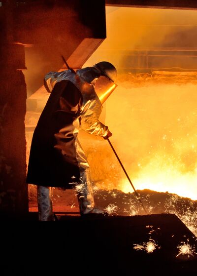 steel worker and hot steel